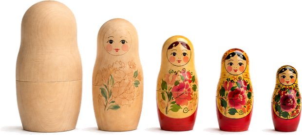 Five dolls, blank through to fully painted